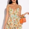 EVERYTHING AND MORE FLORAL ROMPER -AKIRA Shop everything and more floral romper yellow multi 1 1