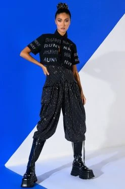 LONDON RHINESTONE STRIPE RELAXED FIT HALTER NECK JUMPSUIT -AKIRA Shop london rhinestone stripe relaxed fit halter neck jumpsuit black 3 3