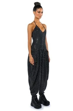 LONDON RHINESTONE STRIPE RELAXED FIT HALTER NECK JUMPSUIT -AKIRA Shop london rhinestone stripe relaxed fit halter neck jumpsuit black 4 4