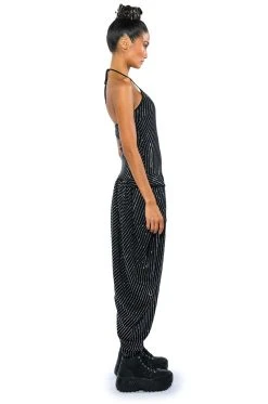 LONDON RHINESTONE STRIPE RELAXED FIT HALTER NECK JUMPSUIT -AKIRA Shop london rhinestone stripe relaxed fit halter neck jumpsuit black 7 7